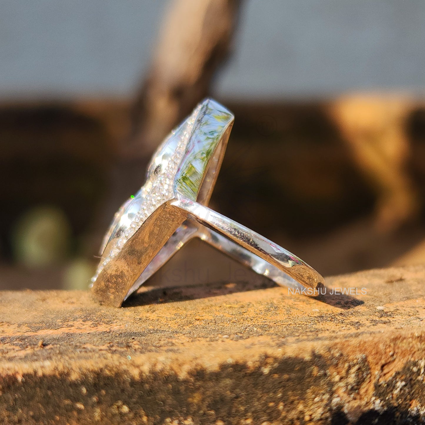 Pear Cut Bezel Set Two Stone Moissanite Engagement Ring