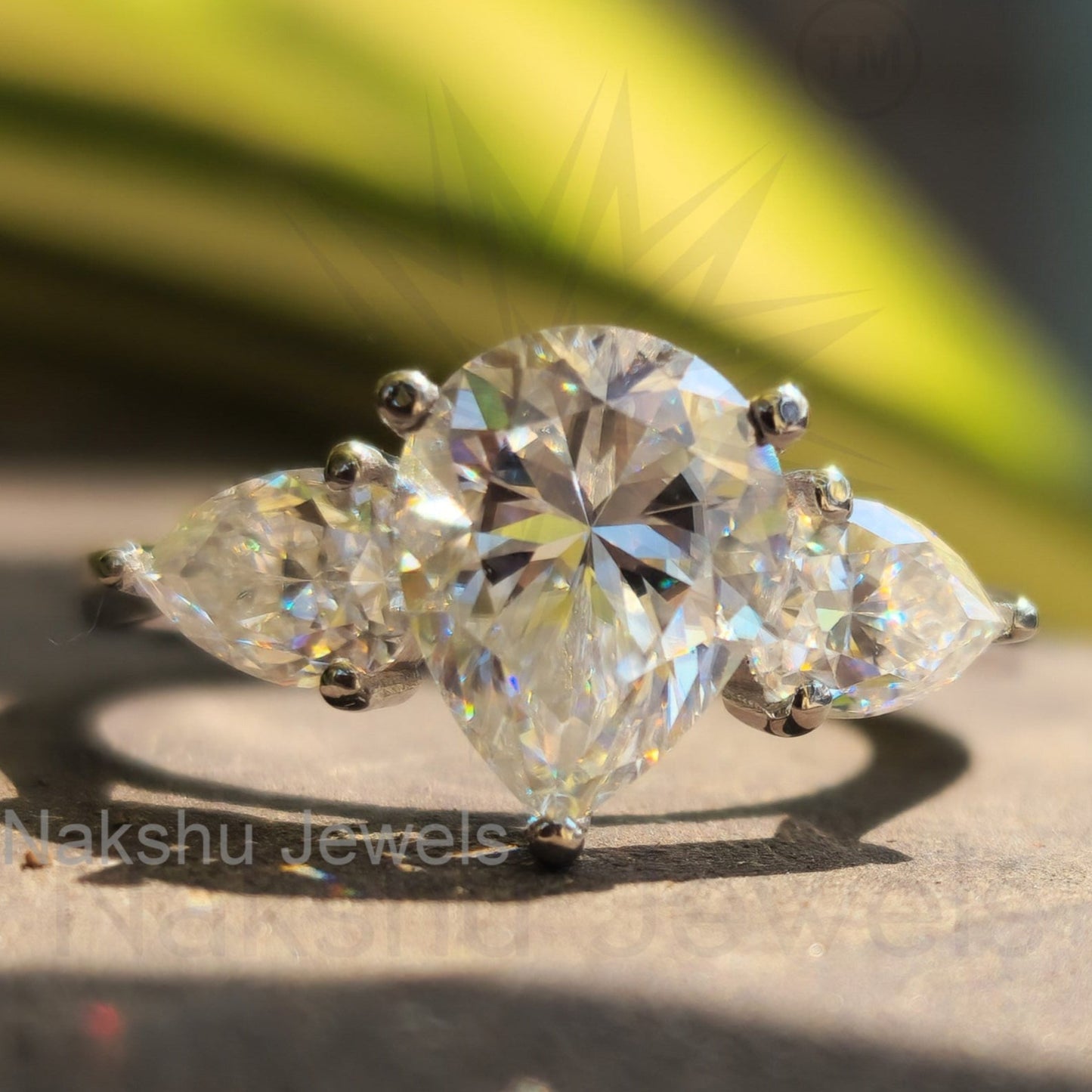 Classic Pear Cut Three Stone Moissanite Engagement Ring