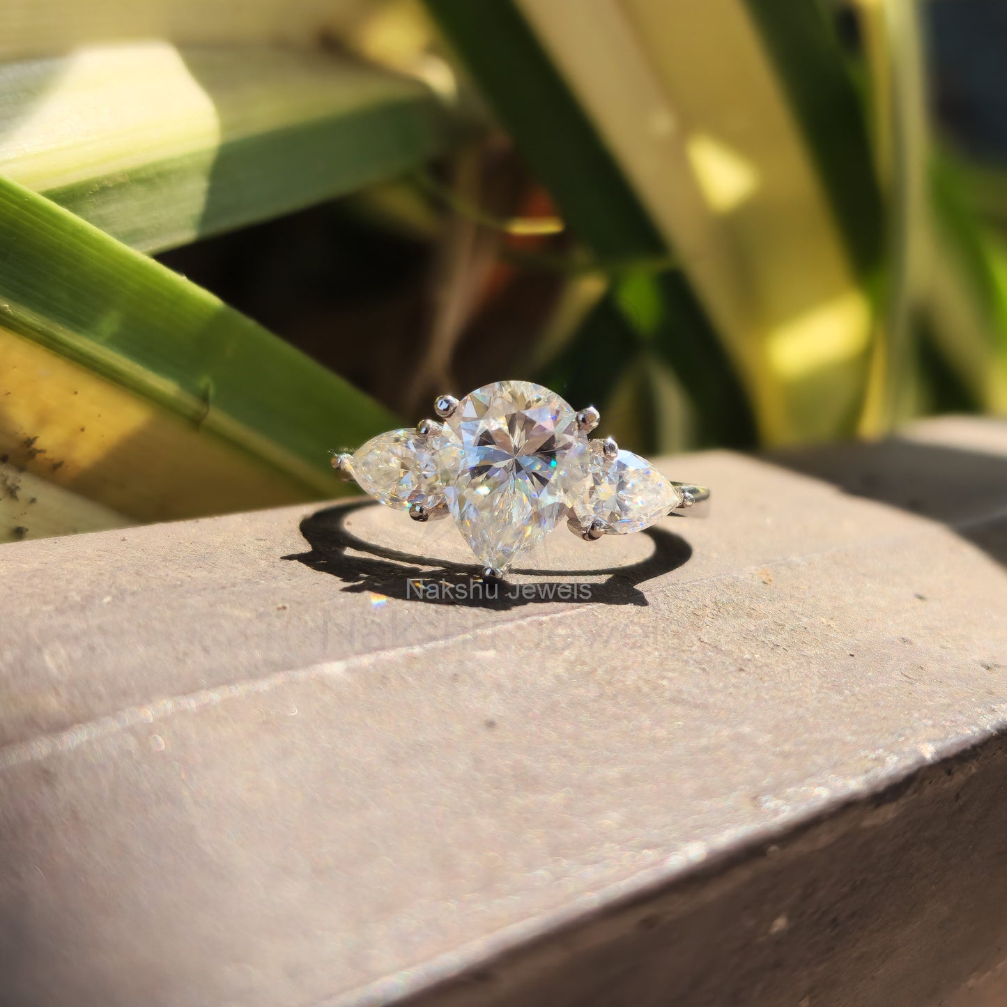 Classic Pear Cut Three Stone Moissanite Engagement Ring