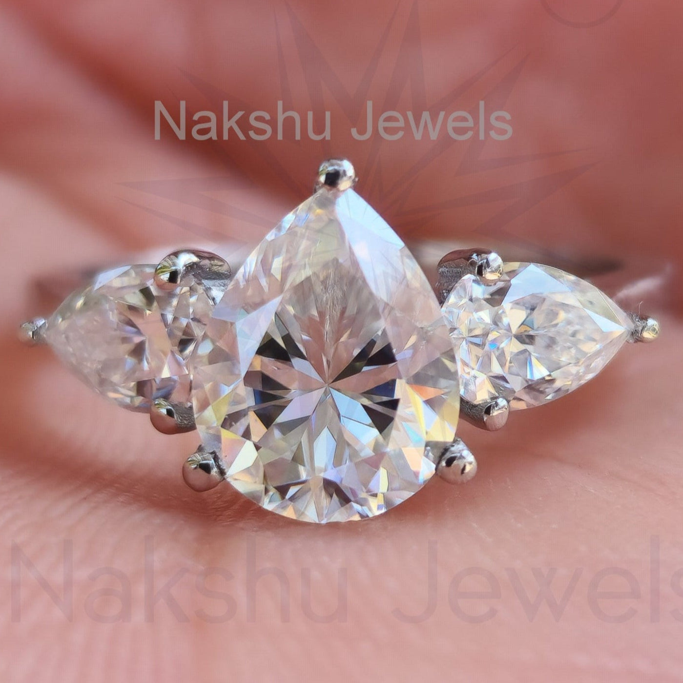 Classic Pear Cut Three Stone Moissanite Engagement Ring
