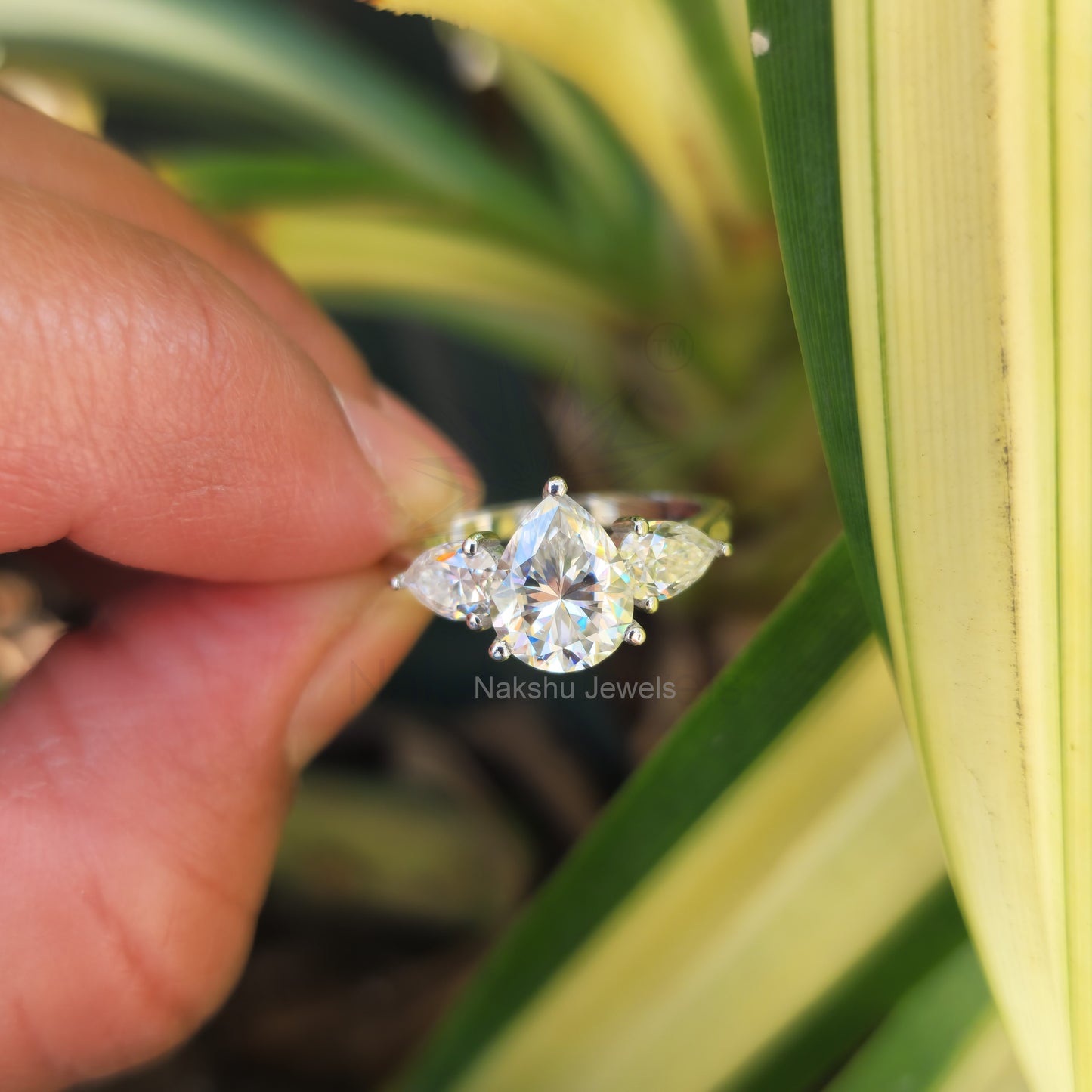 Classic Pear Cut Three Stone Moissanite Engagement Ring