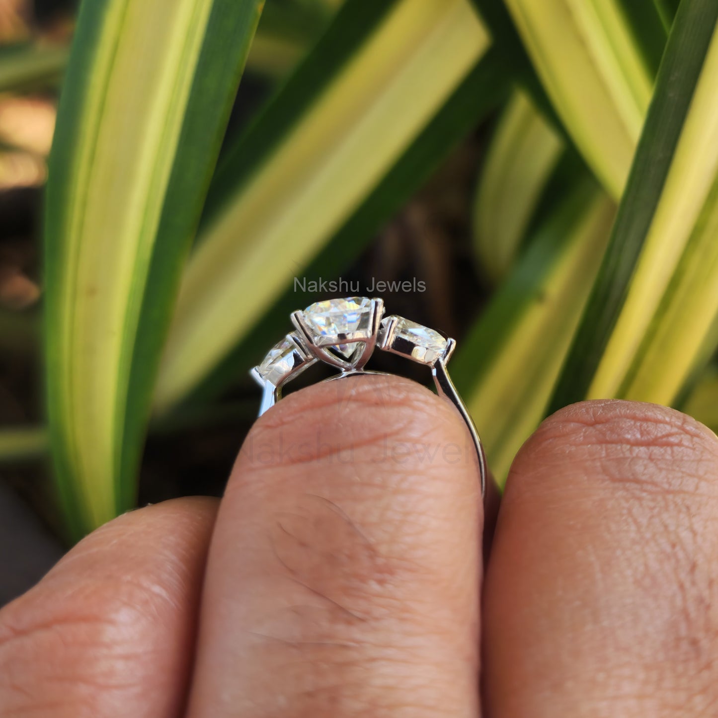 Classic Pear Cut Three Stone Moissanite Engagement Ring