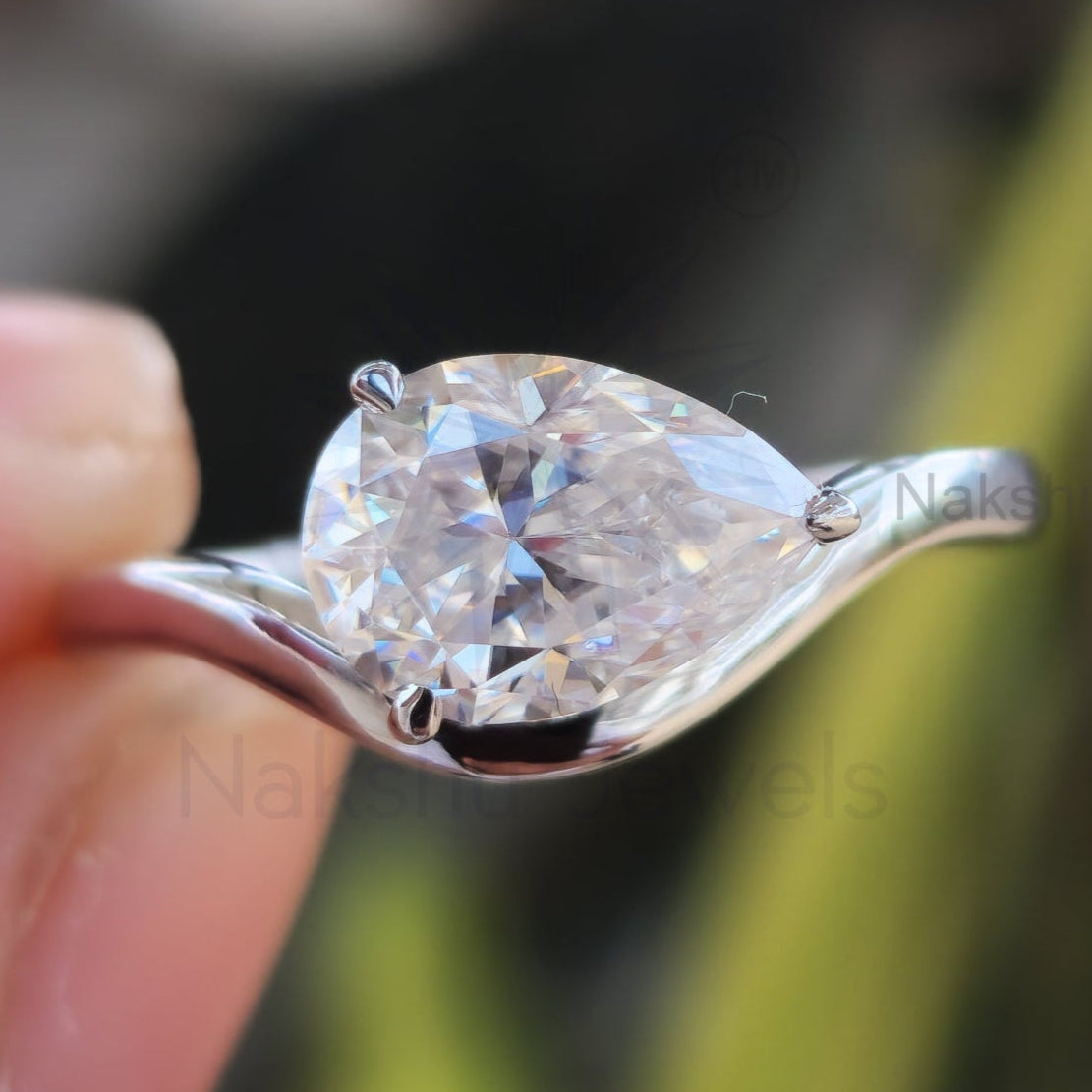 Pear Moissanite Wave Band Engagement Ring