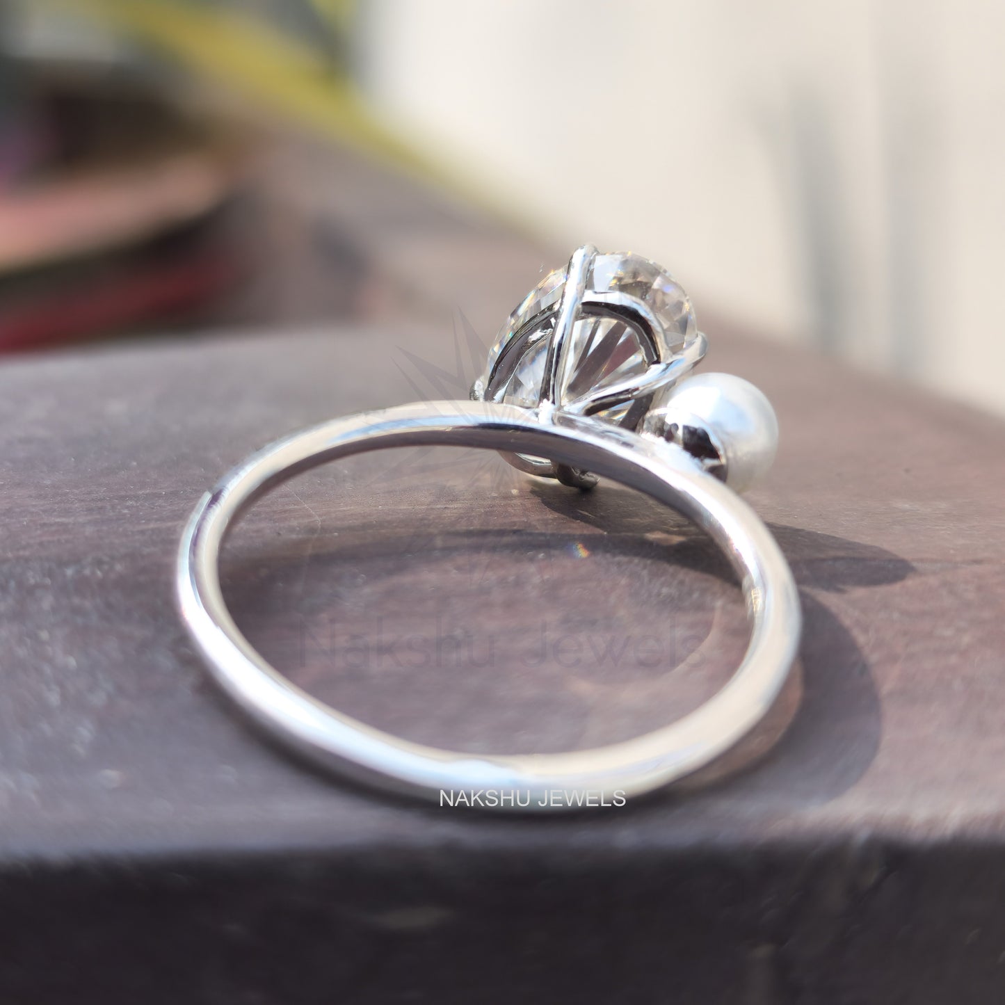 Ariana Grande's Oval & pearl Moissanite Engagement Ring - Celebrity Ring
