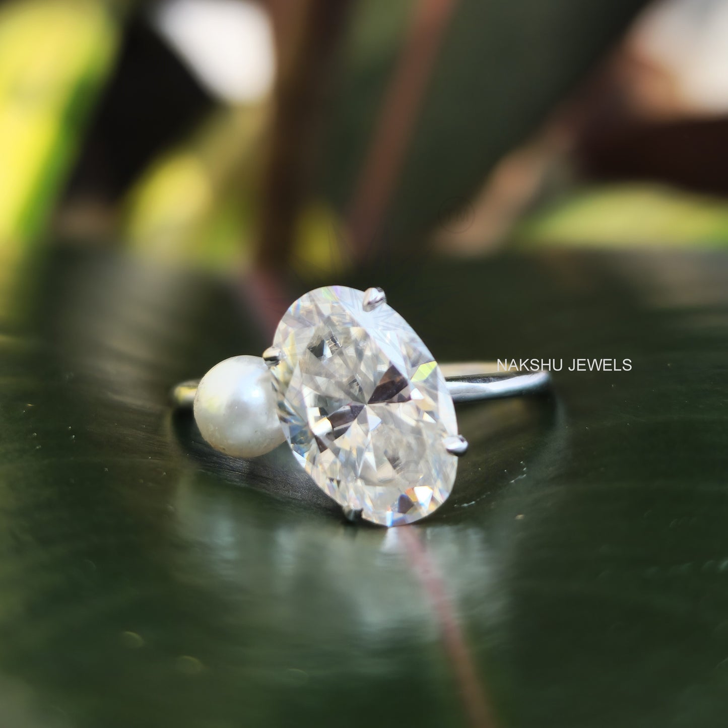 Ariana Grande's Oval & pearl Moissanite Engagement Ring - Celebrity Ring