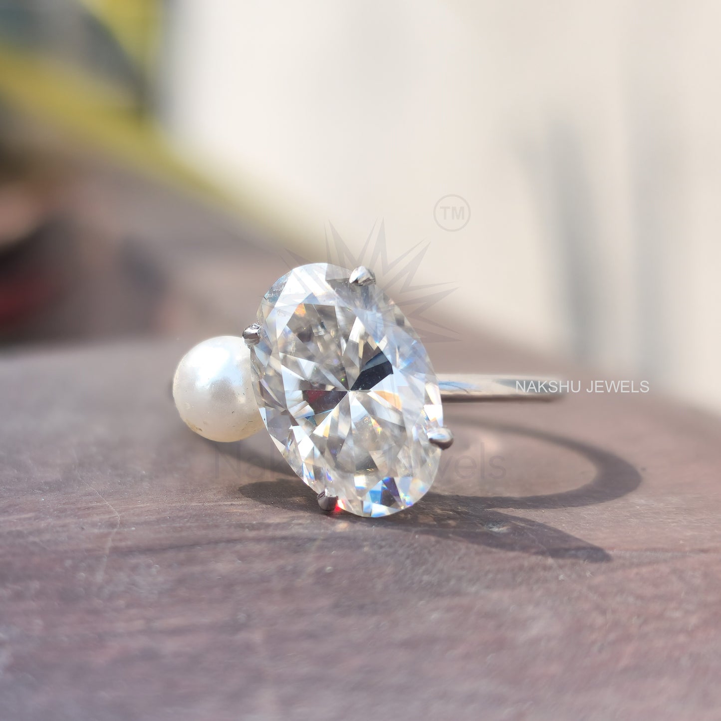 Ariana Grande's Oval & pearl Moissanite Engagement Ring - Celebrity Ring