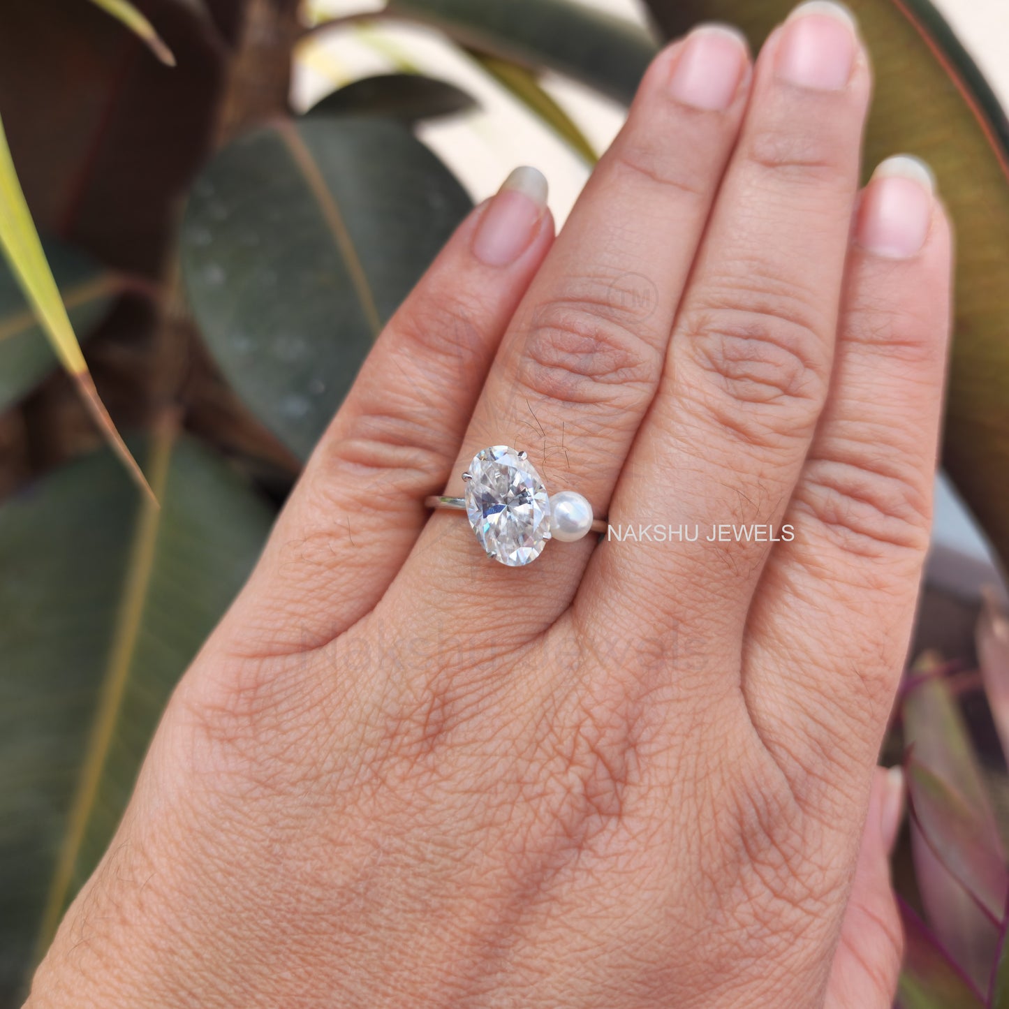 Ariana Grande's Oval & pearl Moissanite Engagement Ring - Celebrity Ring