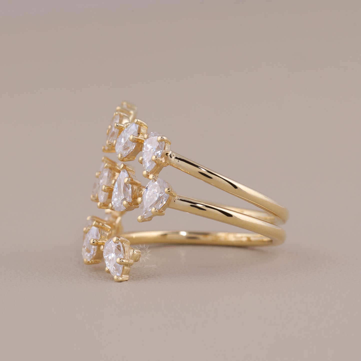 Pear Cut Moissanite Spiral Wrap Ring with Scattered Cluster Design