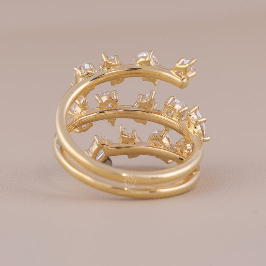 Pear Cut Moissanite Spiral Wrap Ring with Scattered Cluster Design