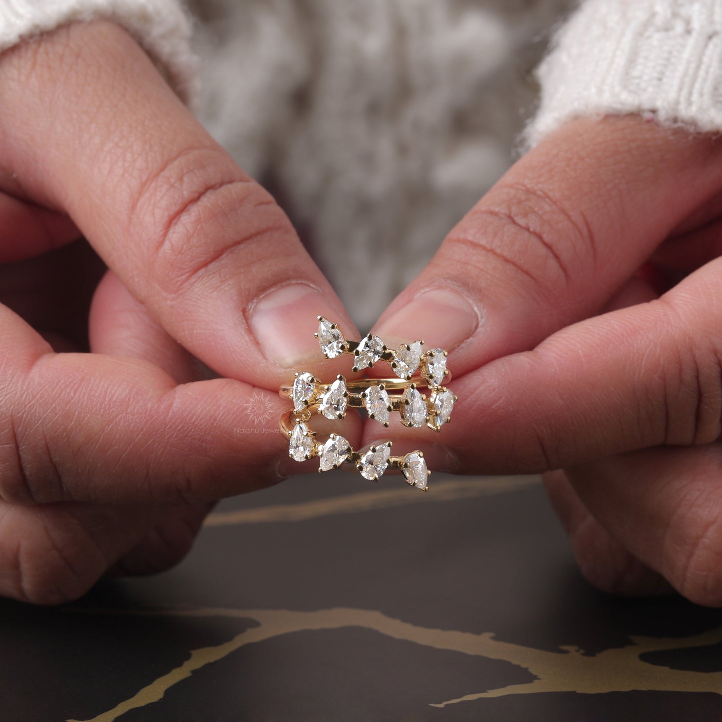 Pear Cut Moissanite Spiral Wrap Ring with Scattered Cluster Design