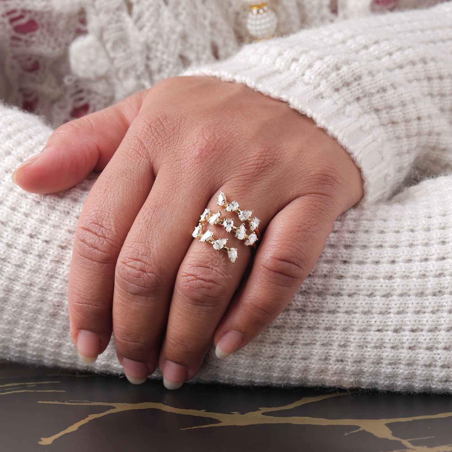 Pear Cut Moissanite Spiral Wrap Ring with Scattered Cluster Design