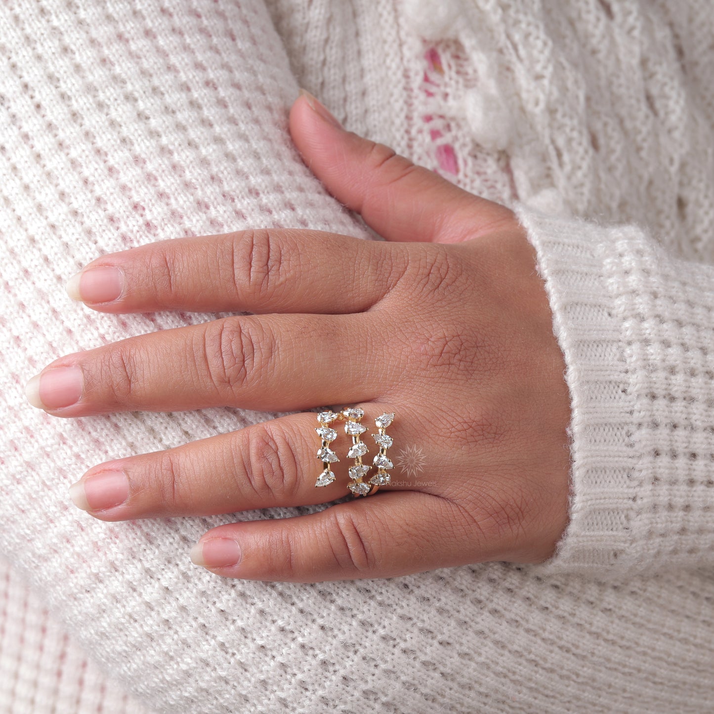 Pear Cut Moissanite Spiral Wrap Ring with Scattered Cluster Design