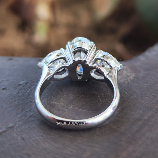 Oval and Pear Cut Moissanite Three Stone Engagement Ring