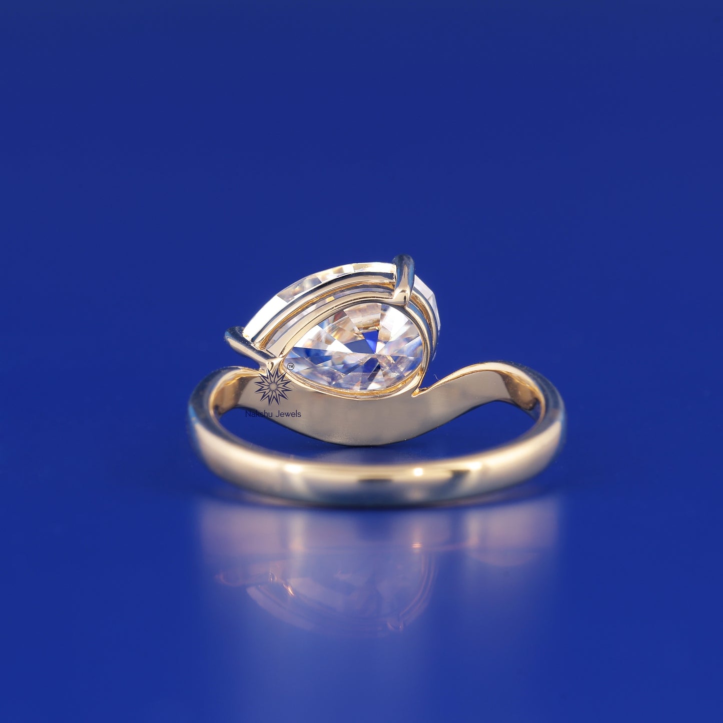 Oval Cut Curved Solitaire Moissanite Engagement Ring