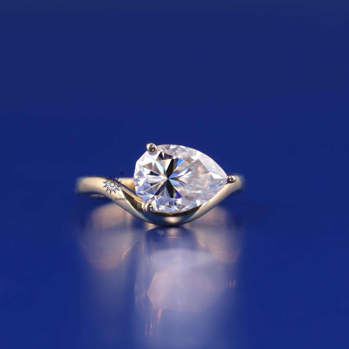 Oval Cut Curved Solitaire Moissanite Engagement Ring