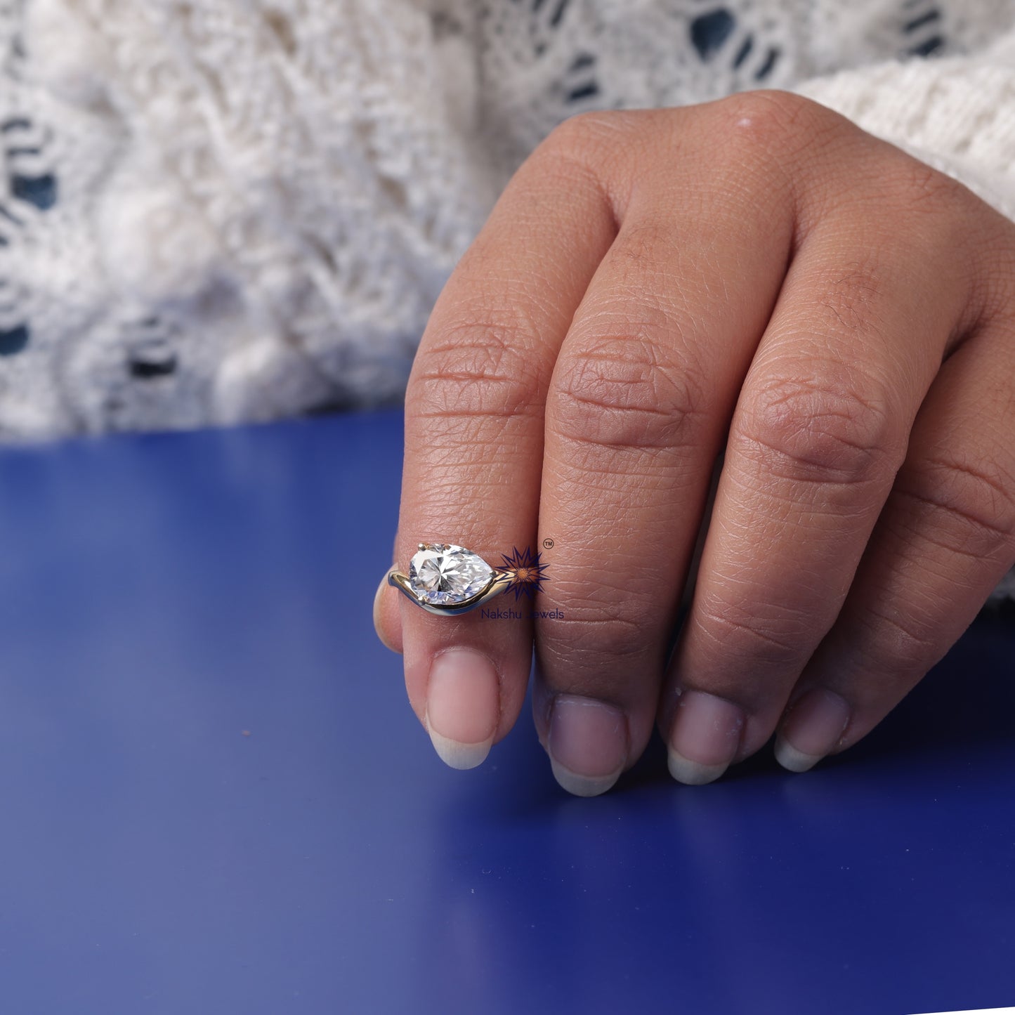 Oval Cut Curved Solitaire Moissanite Engagement Ring