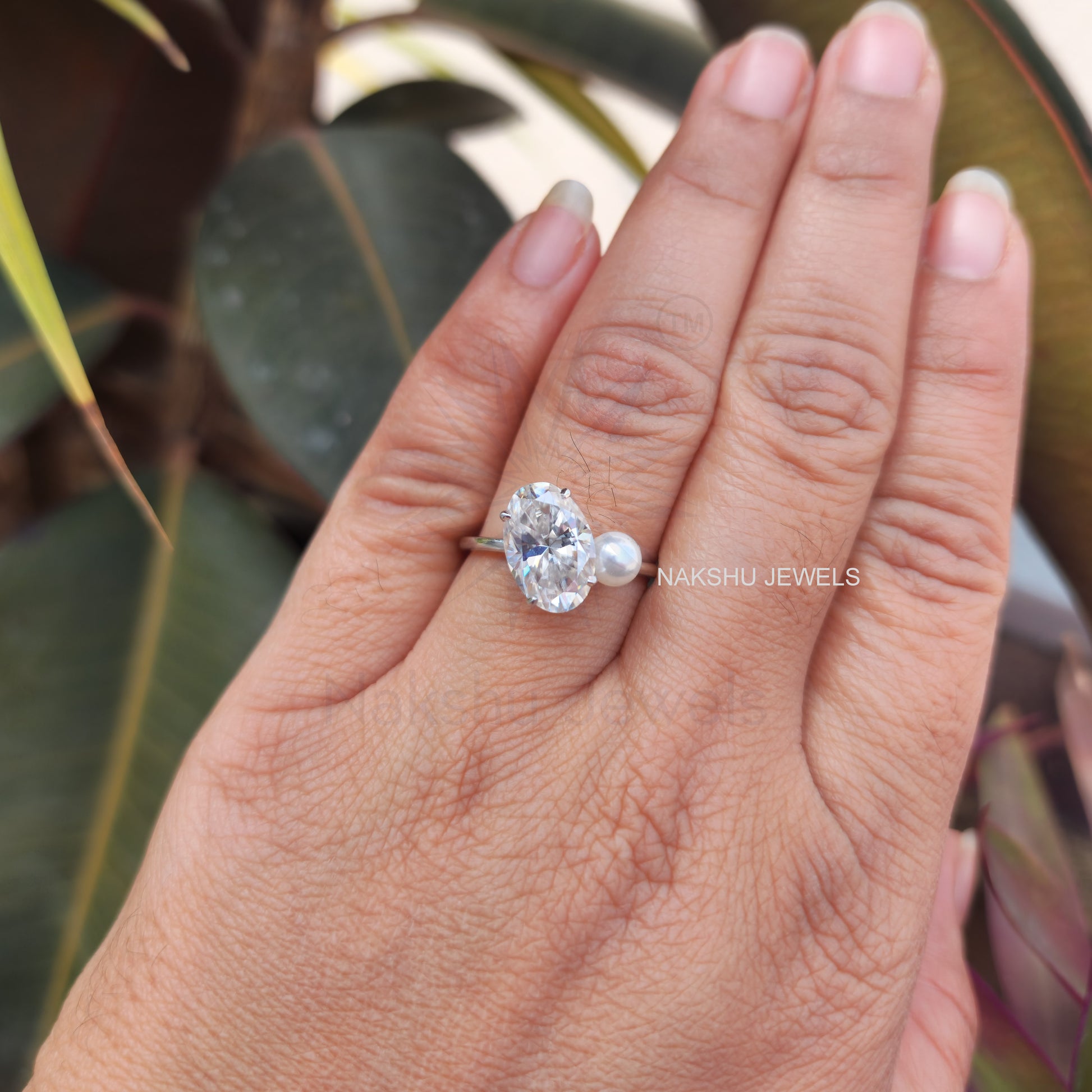 Ariana Grande's Oval Moissanite Pearl Ring: Celebrity Style