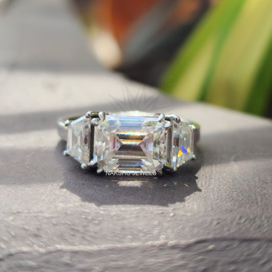 East to West Emerald Cut Three Stone Moissanite Engagement Ring