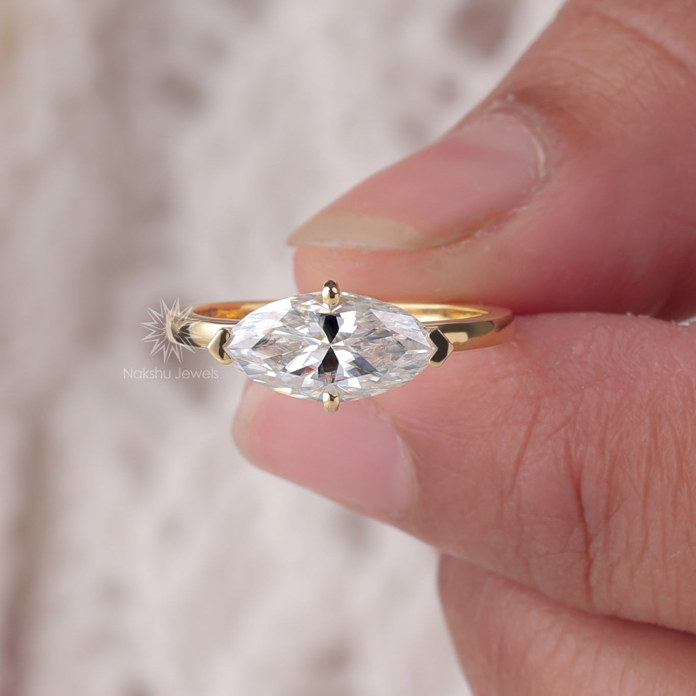 East-West Marquise Cut Moissanite Solitaire Ring